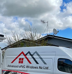 Advanced uPVC Windows NZ staff fitting new premium NZ made uPVC windows and doors at a customers home